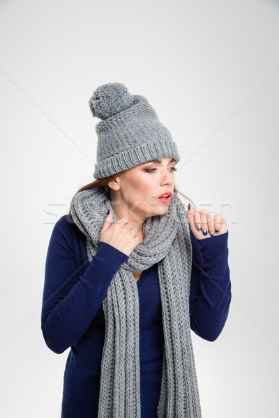 Portrait of a young ill woman coughs Stock photo © deandrobot