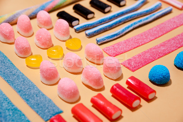 Close up of mixed multicolored sweet candies and lollies Stock photo © deandrobot