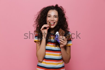 Young girl in summer hat and swimsuit chewing bubble gum Stock photo © deandrobot