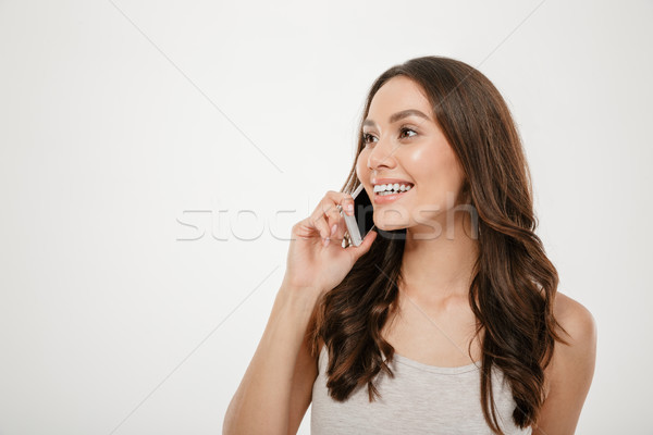 Portret kobieta długo brązowe włosy uśmiechnięty Zdjęcia stock © deandrobot