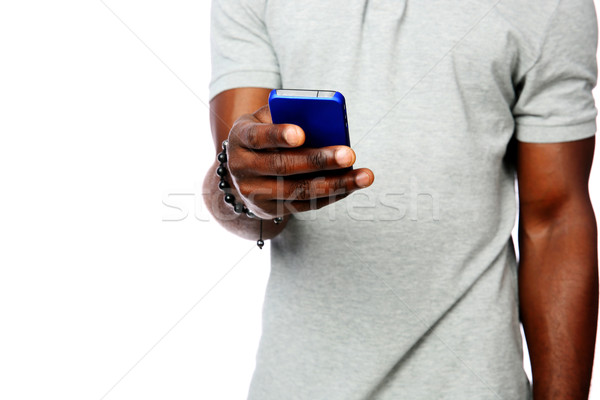 Closeup portrait of a male hands using smartphone isolated on white background Stock photo © deandrobot
