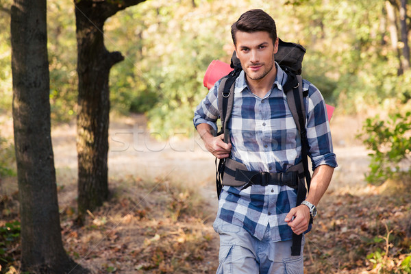 Man traveling outdoors Stock photo © deandrobot