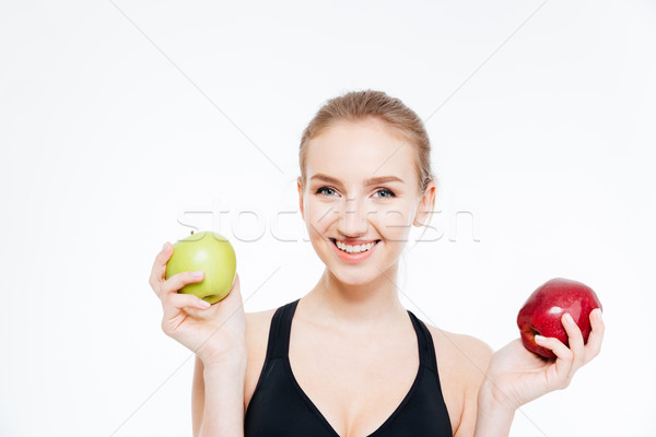 Boldog gyönyörű sportoló tart zöld piros Stock fotó © deandrobot
