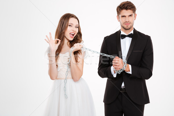 Portrait of bride with related groom Stock photo © deandrobot