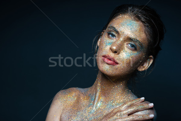 Beauty portrait of gorgeous young woman with sparkling makeup Stock photo © deandrobot