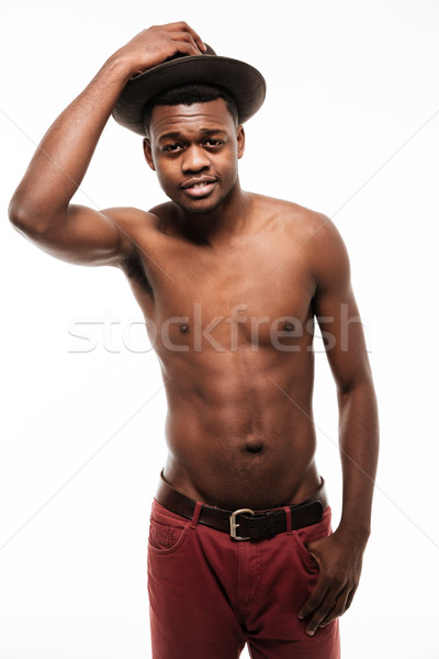 Amazing young african sportsman wearing hat Stock photo © deandrobot