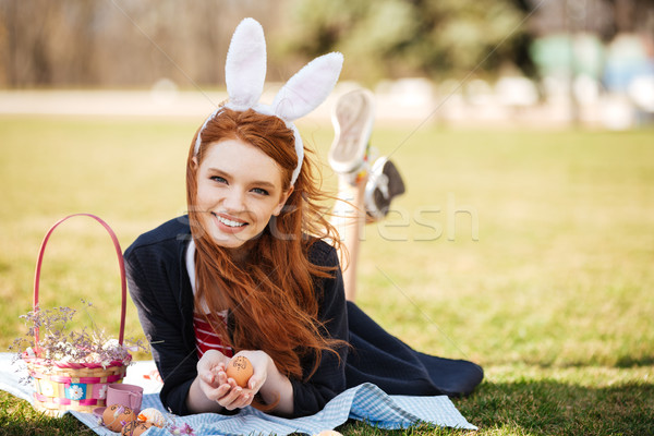 Portrait of a smiling happy red head girl Stock photo © deandrobot