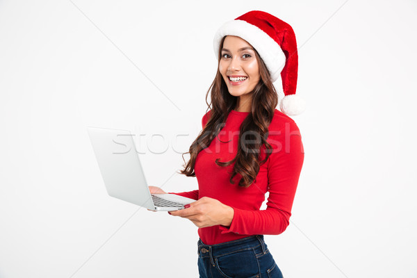 Portrait of an excited cheery asian girl Stock photo © deandrobot