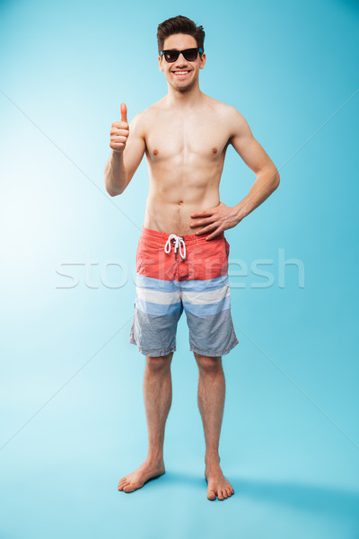 Portrait souriant jeunes torse nu homme [[stock_photo]] © deandrobot