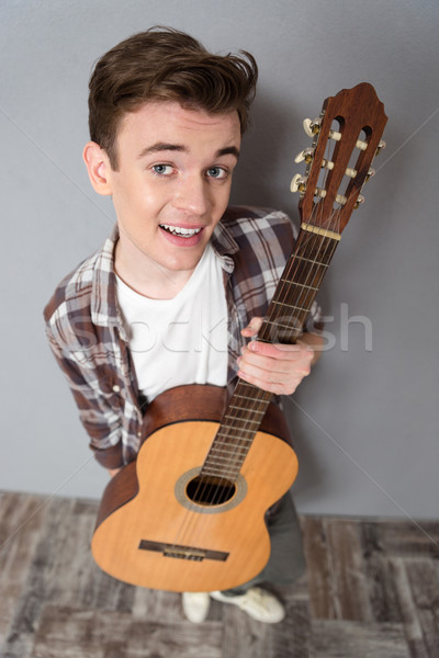 若い男 立って ギター 先頭 表示 肖像 ストックフォト © deandrobot