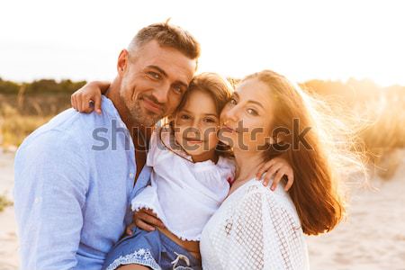 Coppia ridere spiaggia gioioso Foto d'archivio © deandrobot