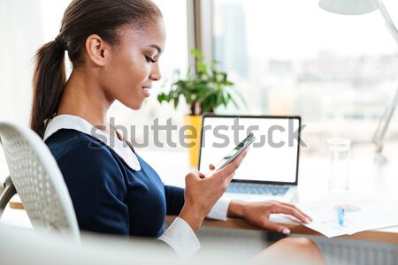African business woman drinking water Stock photo © deandrobot
