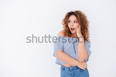 Surprised woman in singlet Stock photo © deandrobot