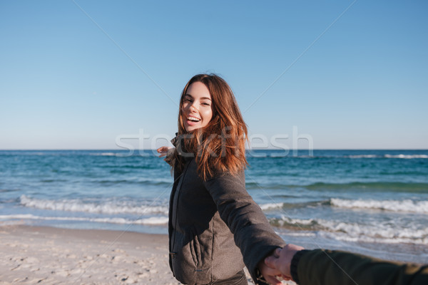 First person view man holding hand of woman Stock photo © deandrobot