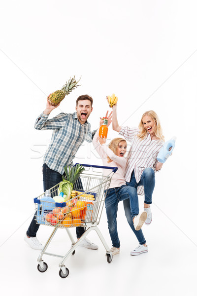 Foto stock: Retrato · família · feliz · em · pé · carrinho · de · compras