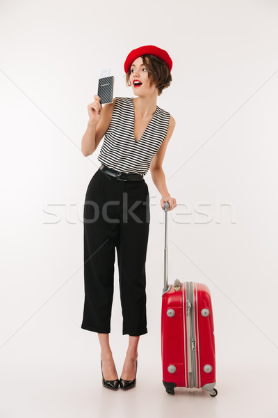 Full length portrait of a cheerful woman Stock photo © deandrobot