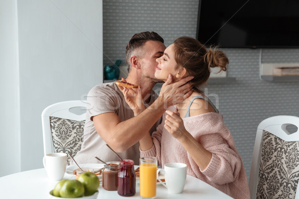 Ritratto felice amorevole Coppia colazione seduta Foto d'archivio © deandrobot