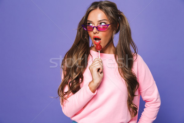 Portré elegáns fiatal lány kettő pulóver eszik Stock fotó © deandrobot