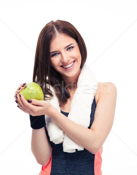 Foto stock: Sonriendo · mujer · de · la · aptitud · manzana · toalla · verde