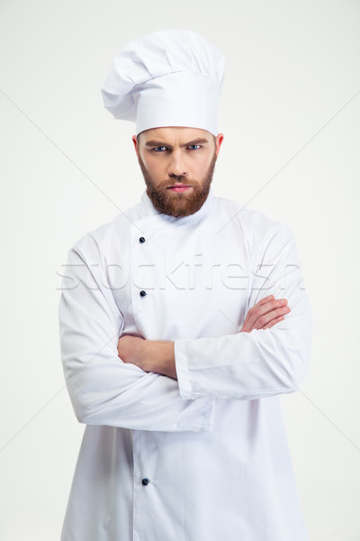 Male chef cook standing with arms folded Stock photo © deandrobot