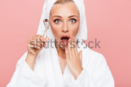 Meglepett szőke nő néz kamera izolált fehér Stock fotó © deandrobot