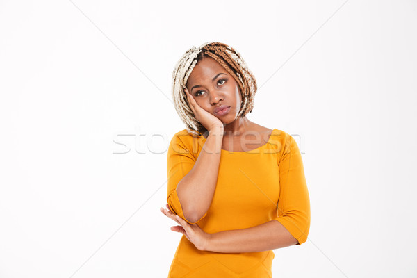 Triste s'ennuie jeune femme jaune robe [[stock_photo]] © deandrobot