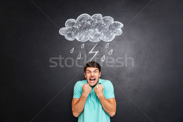 Zdjęcia stock: Mad · człowiek · stałego · pioruna · deszcz