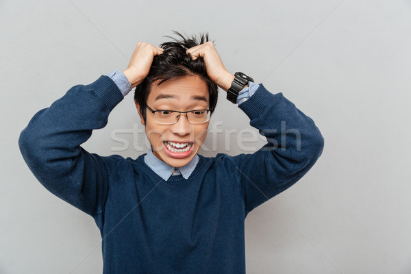 ázsiai férfi pánik szürke üzlet arc Stock fotó © deandrobot