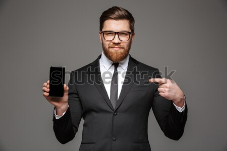 Jóvenes hombre de negocios cocaína gafas traje negro aislado Foto stock © deandrobot