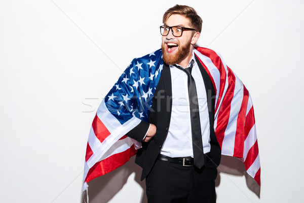 Business man wrapped in a flag Stock photo © deandrobot