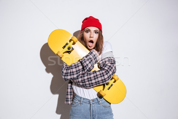 Foto d'archivio: Confusi · donna · isolato · bianco · skateboard