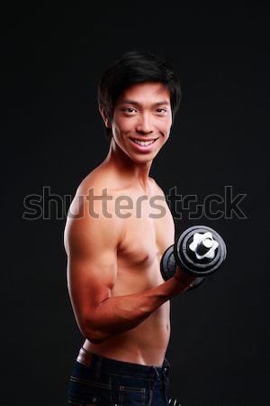 Portré boldog ázsiai férfi tart súlyzó Stock fotó © deandrobot