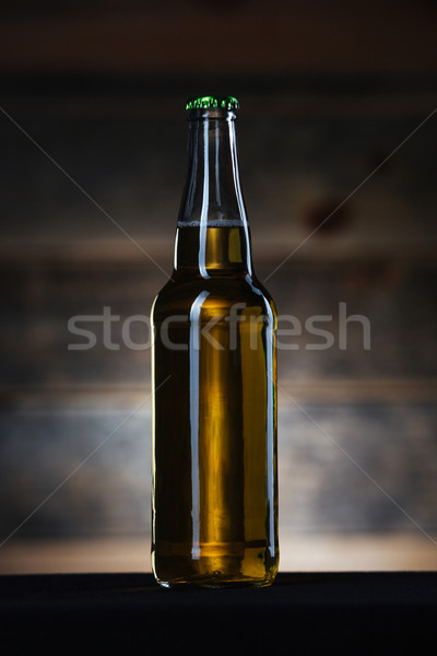 Bottle with beer Stock photo © deandrobot