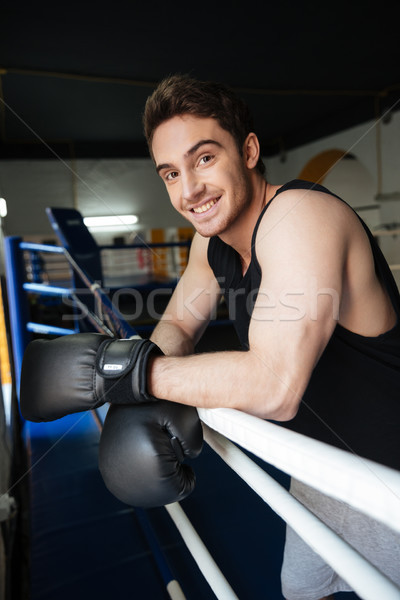 Smiling boxer looking at camera Stock photo © deandrobot
