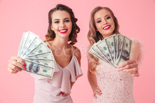 Deux jeunes femmes 20s robes [[stock_photo]] © deandrobot