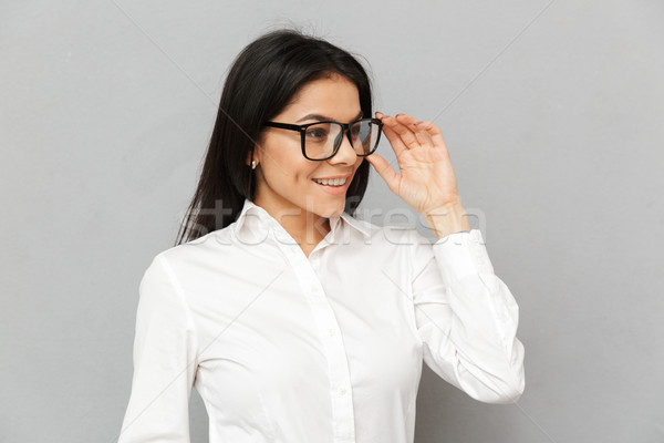 Portrait closeup of smiling successful woman with long brown hai Stock photo © deandrobot