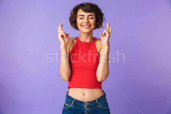 Portré derűs fiatal lány mutat ujjak jó Stock fotó © deandrobot