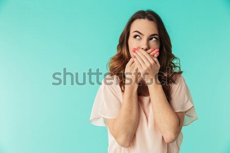 Photo of excited pretty woman 20s wearing fashion makeup and ear Stock photo © deandrobot