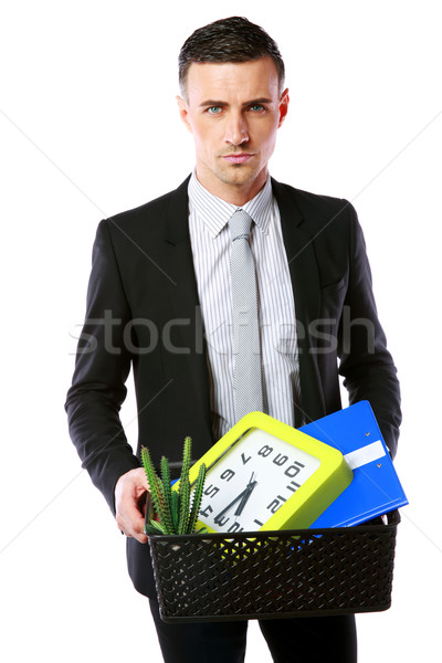 You are fired! Businessman hold box with personal belongings isolated on white background Stock photo © deandrobot