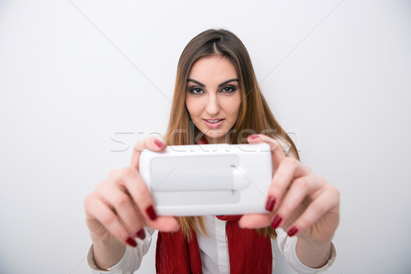 Heureux jeune femme photo smartphone gris Photo stock © deandrobot