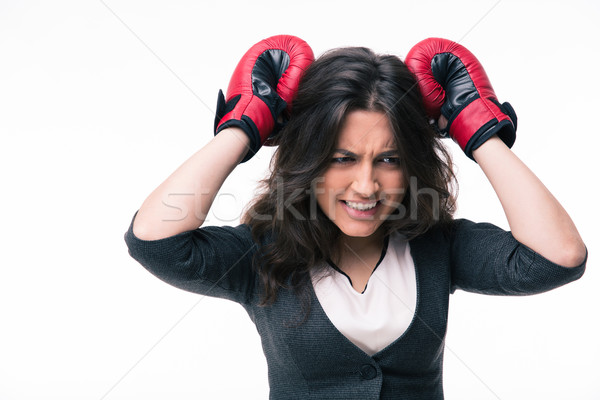 Perdant femme d'affaires gants de boxe isolé blanche triste Photo stock © deandrobot