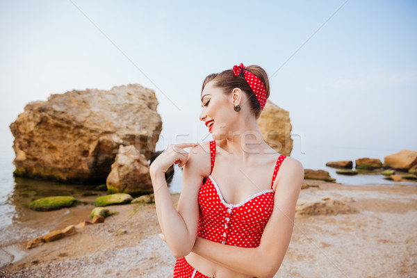 Jeunes belle broches up fille rouge [[stock_photo]] © deandrobot