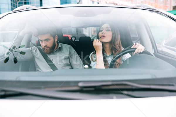 Image of couple in car Stock photo © deandrobot