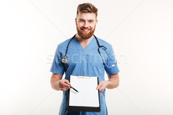 Portret fericit medic de sex masculin medical asistentă îndreptat Imagine de stoc © deandrobot