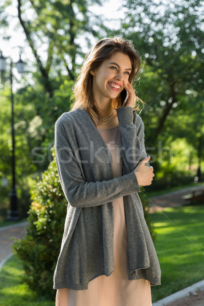 Stock photo: Happy young woman outdoors in park