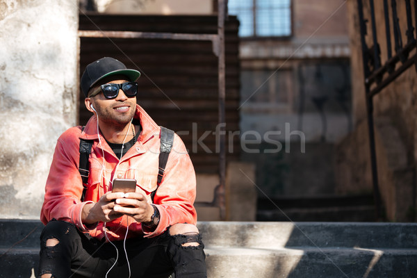 Stock foto: Stylish · african · Mann · Lederjacke · Sitzung · Treppe