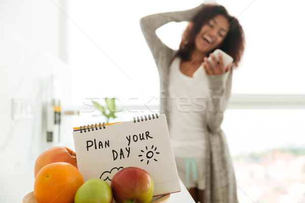 Notebook slogan piano giorno frutti Foto d'archivio © deandrobot