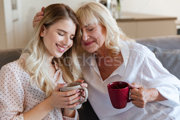 Heiter jungen Dame Sitzung home Großmutter Stock foto © deandrobot