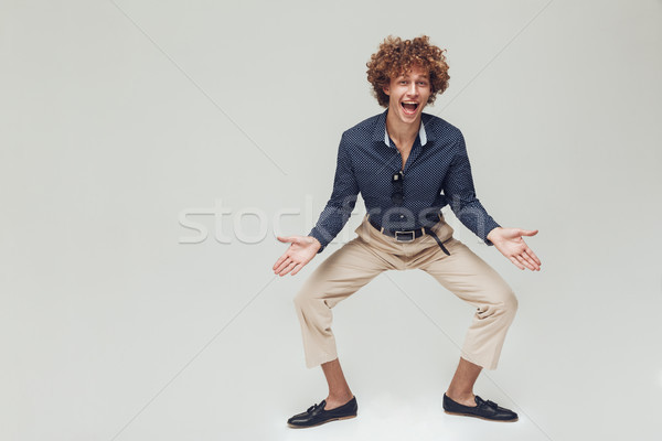 Happy retro man posing isolated. Looking camera. Stock photo © deandrobot