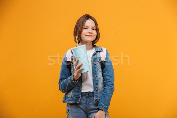 Portrait of a smiling little schoolgirl with backpack Stock photo © deandrobot